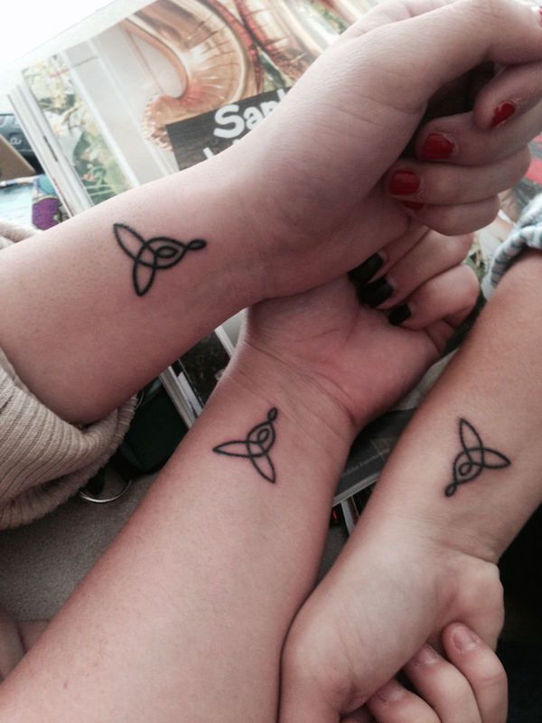 Triquetra knot tattoos for sisters