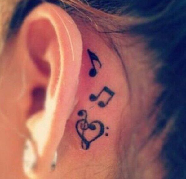 55 Music tattoo behind the ear