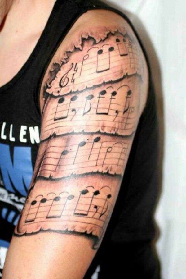 26 Music tattoo on sleeve