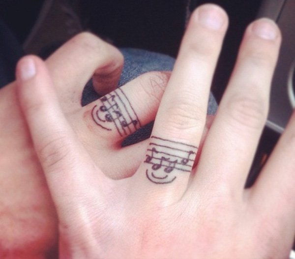 34 Music tattoo on finger