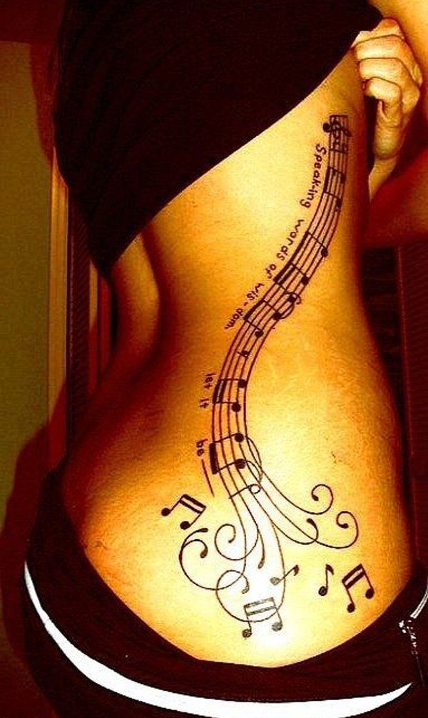 35 Music notes tattoo on side
