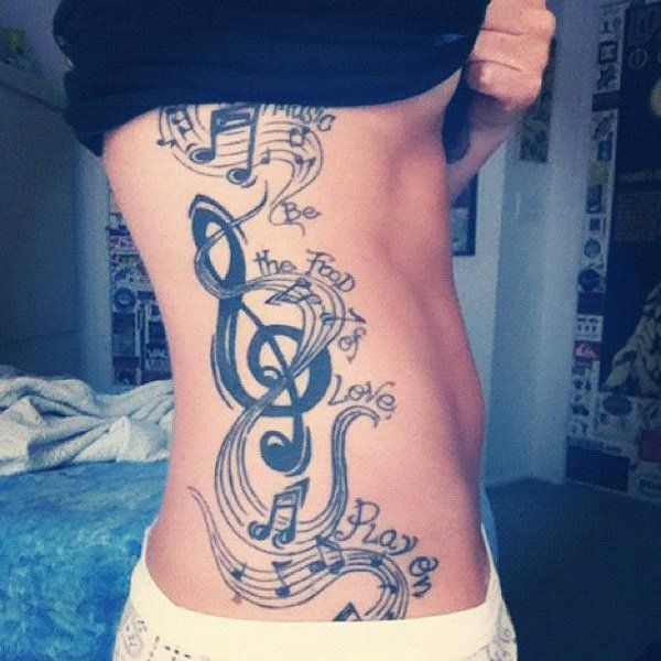 42 Music tattoo on side