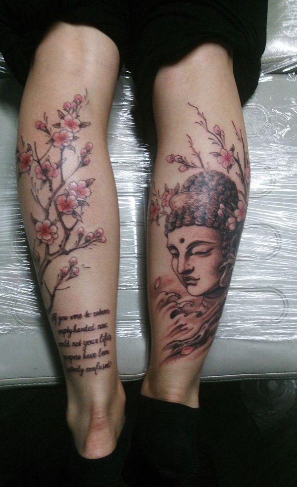 Buda and cherry blossoms legs tattoo
