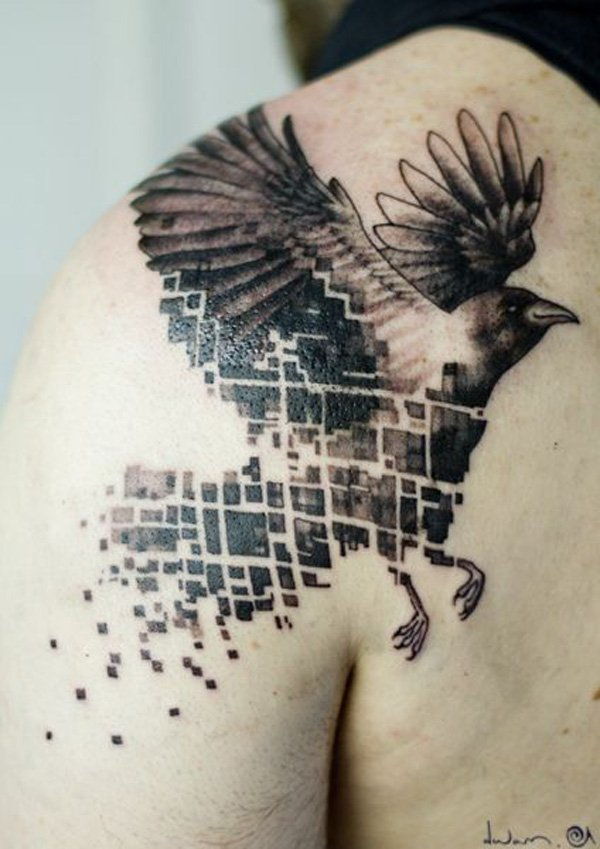 Abstract raven tattoo in dark color with its body painted to plaids and stripes