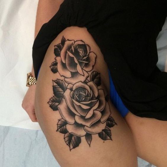 rose thigh tattoo