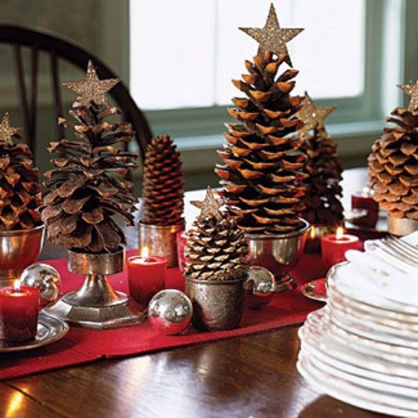 Pritegnitev decor ideas for christmas with small pine cones combined star in top also red candle and silv