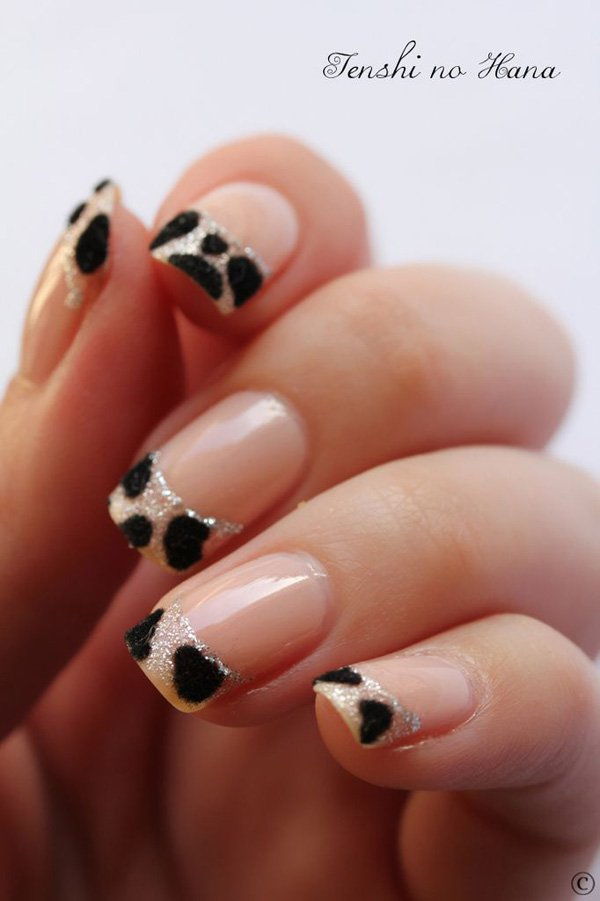 37 nude and black animal print nails