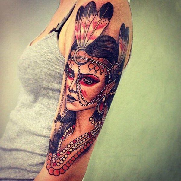 Native American woman upper arm tattoo