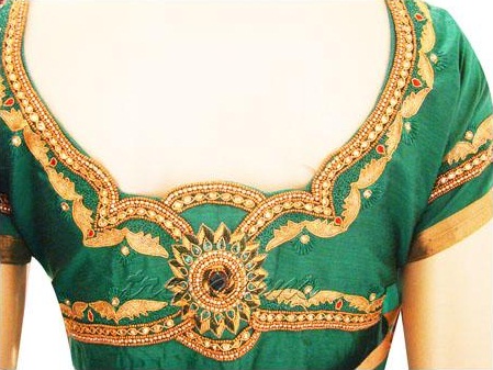 A Golden green Embroidery blouse Design