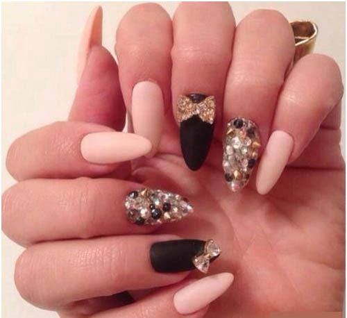 Mat Nail polish with Rhine stone bows and Spikes