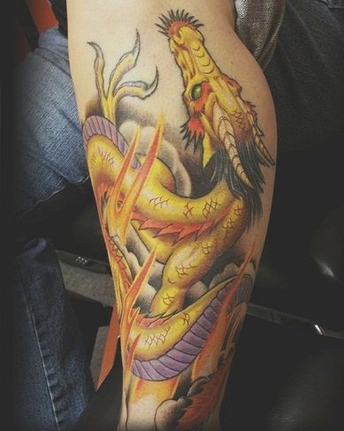 Aranysárga dragon sailor tattoo