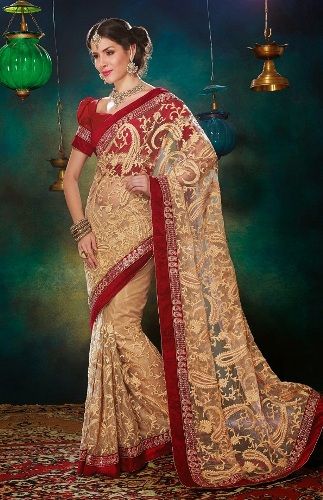  Cream-Coloured-Net-Sari-With-Heavy-Resham-Work-2