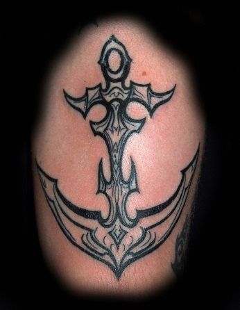 Törzsi cross with anchor design arm tattoo