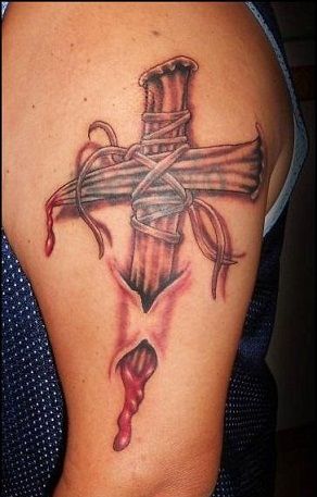 Köröm tribal cross tattoo design