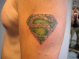 Supermenas Symbol Stone Work Tattoo Design