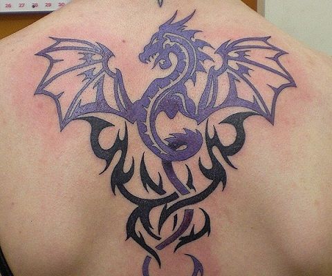 Flying dragon tribal tattoo