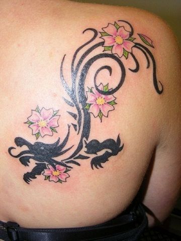 Floral dragon tribal tattoo
