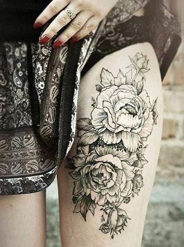 Fekete and white thigh peony tattoo