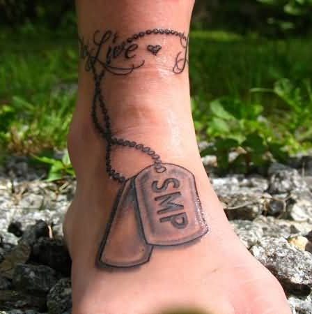 Misto dog chain tag tattoo on ankle