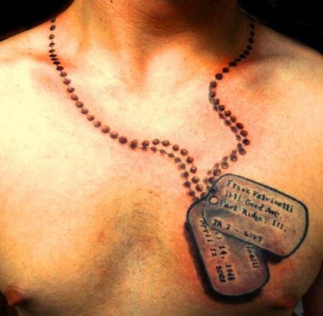 Šuo chest tattoo on left chest