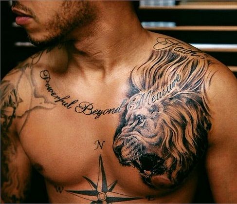 Lion pattern collar bone tattoo