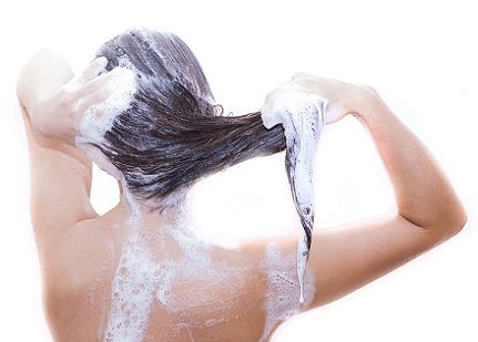 Shampoo Less Often for shiny hair