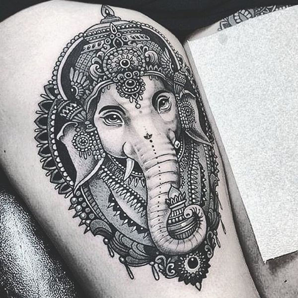 9 Alluring elephant head tattoo on the thigh