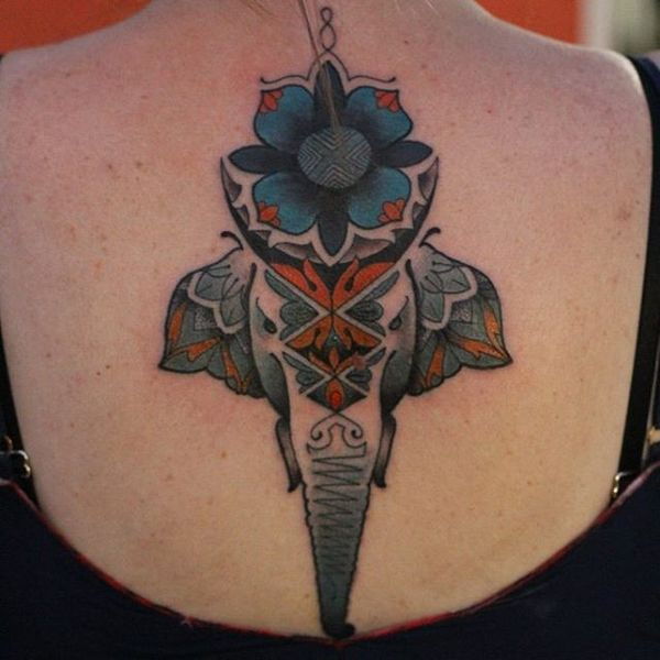 1 symmetrical elephant tattoo on back