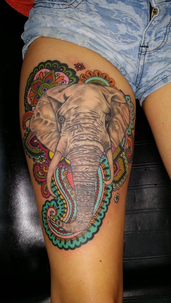 22 Elephant head tattoo in different styles on the thigh