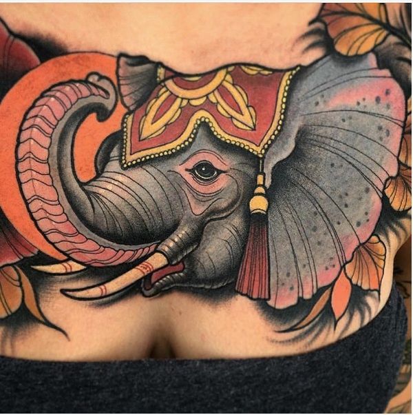 33 Sumptuous cartoon elephant tattoo on the chest