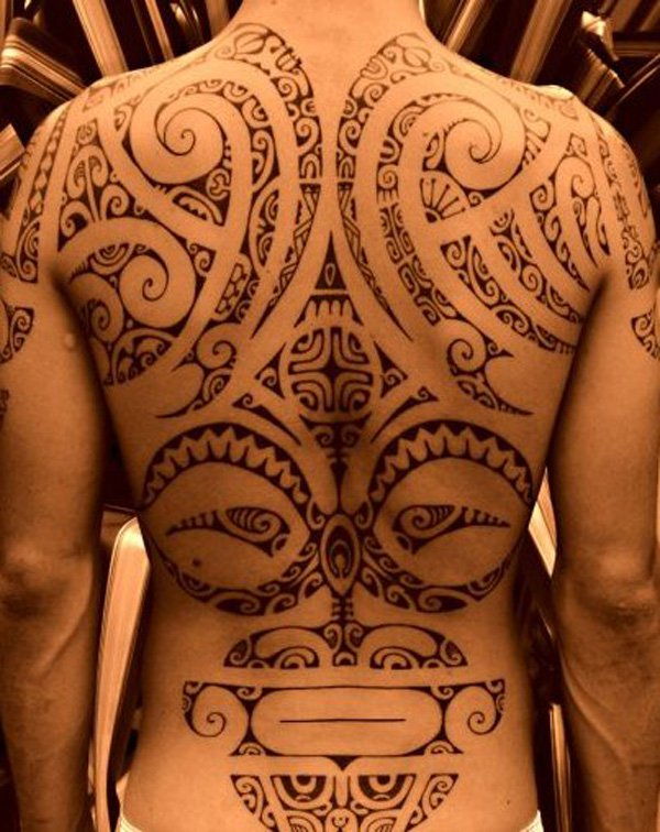 Ornate Maori Tattoo with spirals and tribal shapes designs