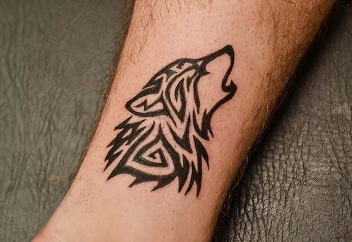 Tribal Wolf Design Arm Tattoo