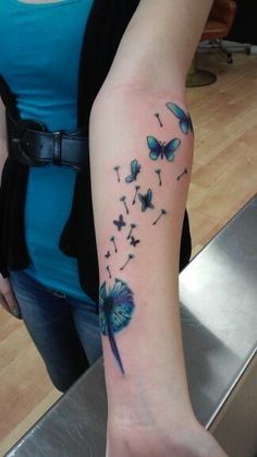 Fluture with dandelion tattoos