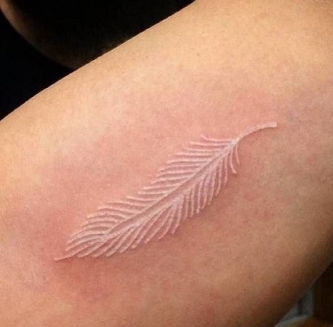 Plunksna Tattoo in white pattern Design