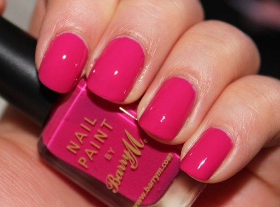 Roz Nail polishes coral pink in pop
